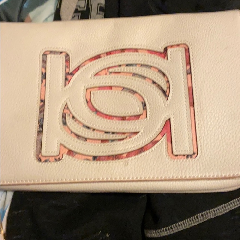 Bebe cross body purse 20 inches across and 5 inches down